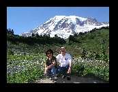 Angie and Jim with Mount Rainier and Paradise wildflowers in the background
